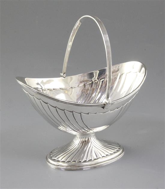 A Victorian silver oval boat shaped sugar basket, by John Newton Mappin, height over handle 172mm, weight